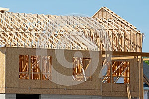 installation of rafters of a plywood house building wall studs wooden framework