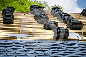 Installation of slate roofing Tiles on a roof