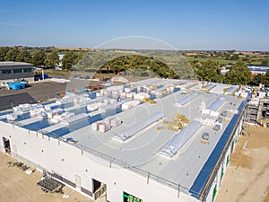 is installed on the roof of a newly built factory building