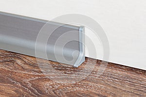 Installed skirting on the wall