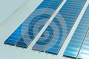 Installing alternative energy photovoltaic solar panels on roof