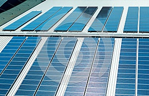 Installing alternative energy photovoltaic solar panels on roof