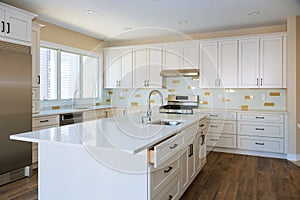 Installing cabinets and counter top a white kitchen partially installed furniture