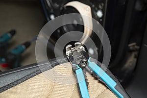 Installing a car speaker system in the door.The installation center. Detaling car center
