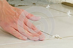 Installing ceramic tile flooring