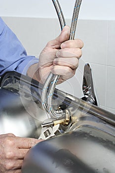 Installing a faucet in a kitchen sink