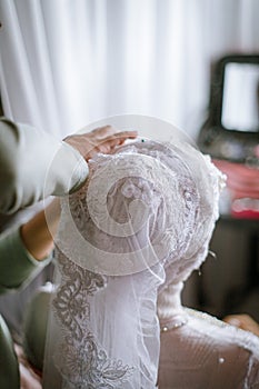 Installing Hijab for Bride before Wedding Ceremonies