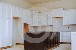 Installing new induction hob in modern kitchen installation of kitchen cabinet