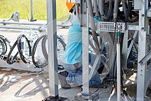 Installing a new mobile network cable behind the phone control cabinet To upgrade to a 5G network, the work of electrical
