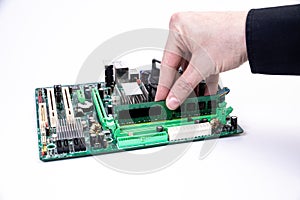 Installing a new RAM DDR memory for a personal computer processor socket in a service. Upgrade repair. PC upgrade or repair