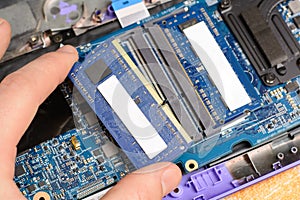 Installing new RAM memory chips to laptop