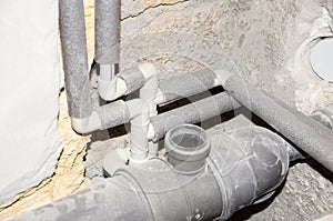 Installing plumbing.