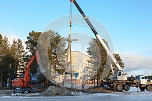 Installing a power pole with the use of special equipment