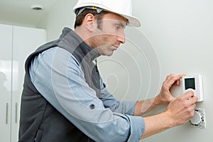 Installing programmable room thermostat