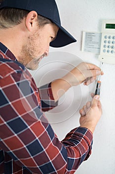 Installing programmable room thermostat