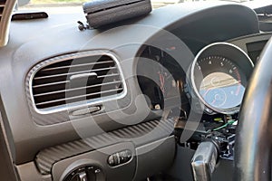 Installing a security alarm in a modern car for the dashboard. GSM security system