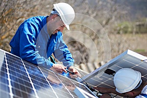 Installing solar photovoltaic panel system on roof of house