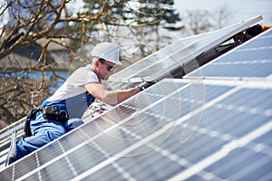 Installing solar photovoltaic panel system on roof of house