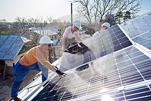 Installing solar photovoltaic panel system on roof of house