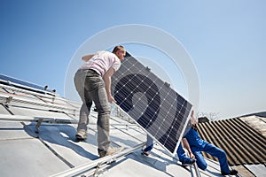 Installing solar photovoltaic panel system on roof of house