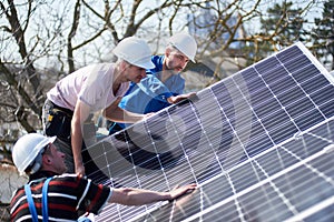 Installing solar photovoltaic panel system on roof of house