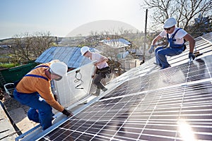 Installing solar photovoltaic panel system on roof of house