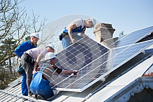 Installing solar photovoltaic panel system on roof of house