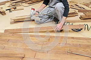 Installing a wooden floor.