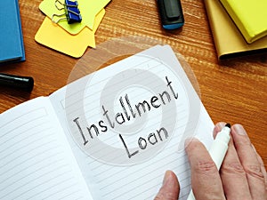 Installment Loan is shown on the conceptual business photo