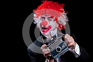 Instant camera clown winking