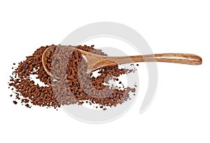 Instant coffee grains in wooden spoon on white background