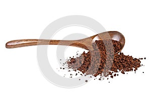 Instant coffee grains in wooden spoon on white background