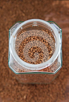 Instant coffee granules in glass bank