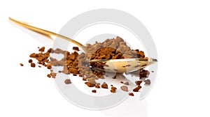 Instant coffee in the spoon on white background