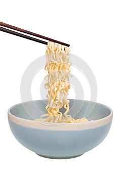 instant noodle in a bowl with chopstick on white background, this has clipping path.