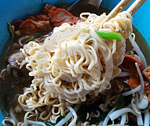 Instant noodle on chopstick