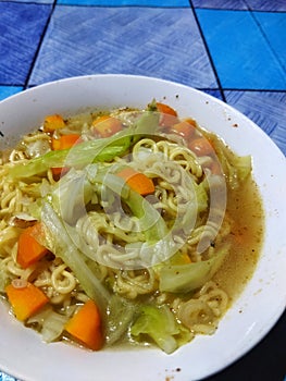 instant noodle food in bowl with mixed vegetables