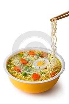 Instant noodles with chopsticks photo