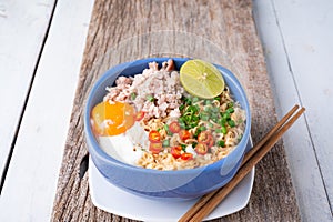 Instant noodles with minced pork and egg in bowl