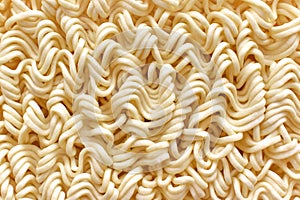 Instant noodles texture background. Uncooked egg noodle.