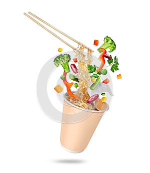 Instant noodles on wooden chopstick with vegetables and greens isolated on white background