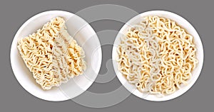 Instant ramen, dried block and soaked, in white bowls over gray