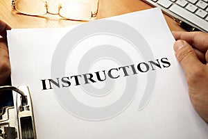 Instructions in a blue folder. photo