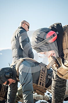 Instructor and army soldiers have hard training and doing push-ups photo