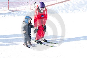 Instructor child activity ski resort winter outfit