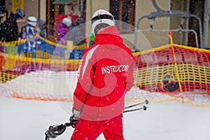 Instructor gives a first ski lesson in Bukovel.
