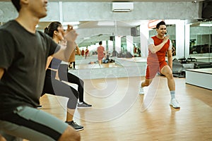 An instructor with stance movements when practicing together