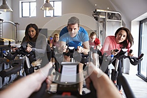 Instructors POV of spinning class at a gym photo