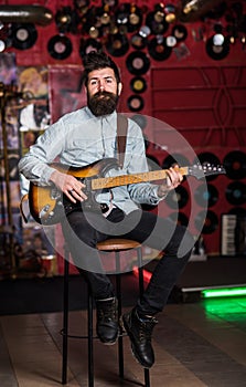 Instrumentalist concept. Composer, talented musician. Musician with beard photo