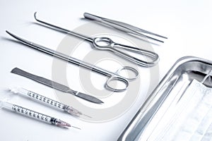 Instruments for plastic surgery on white background